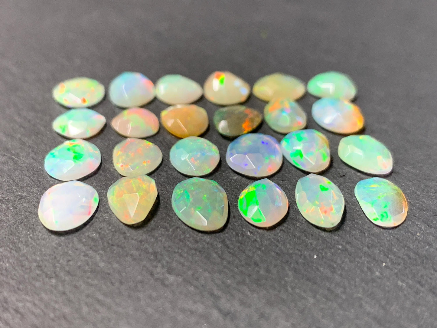 Faceted Ethiopian Opal 9-10mm long cabochon