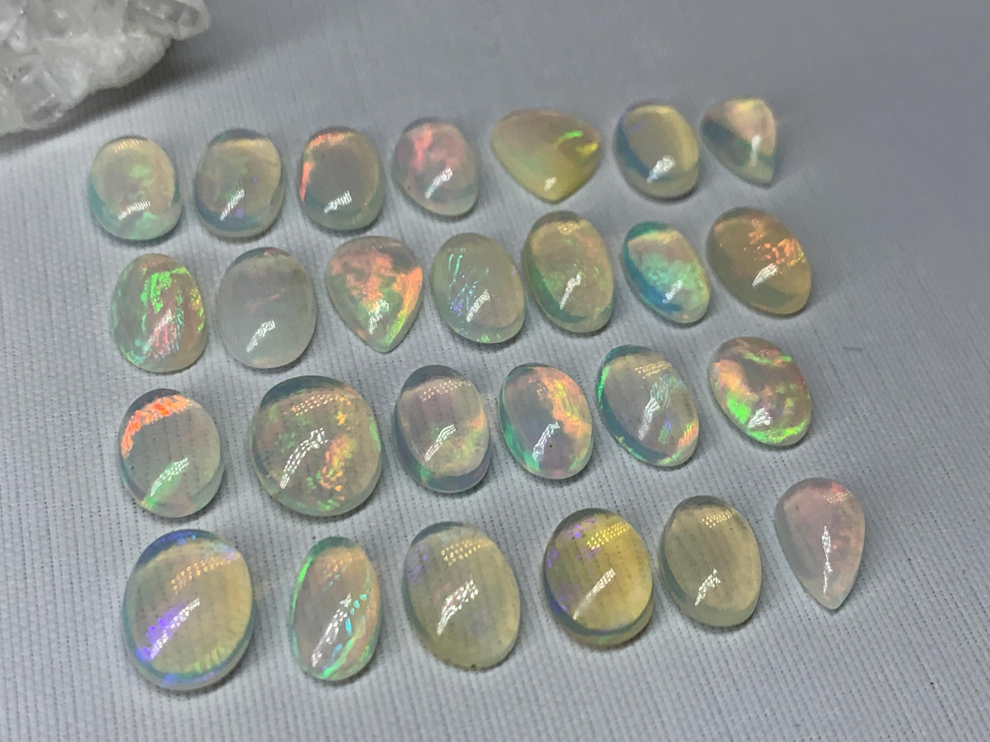 Ethiopian Opal 10-11mm long cabochon