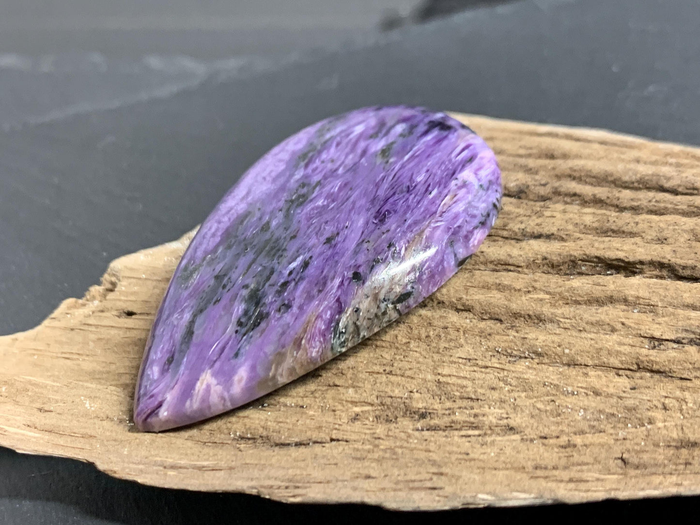 Charoite pear 50x30x7mm cabochon