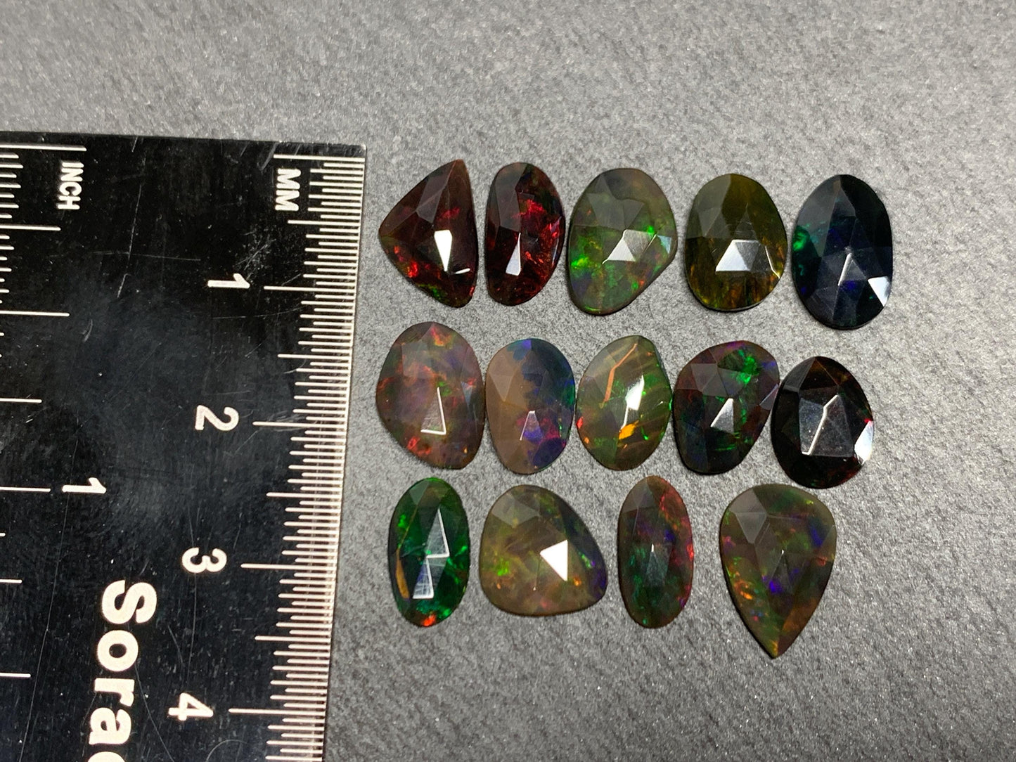 Faceted Black Ethiopian Opal 9-12mm long cabochon