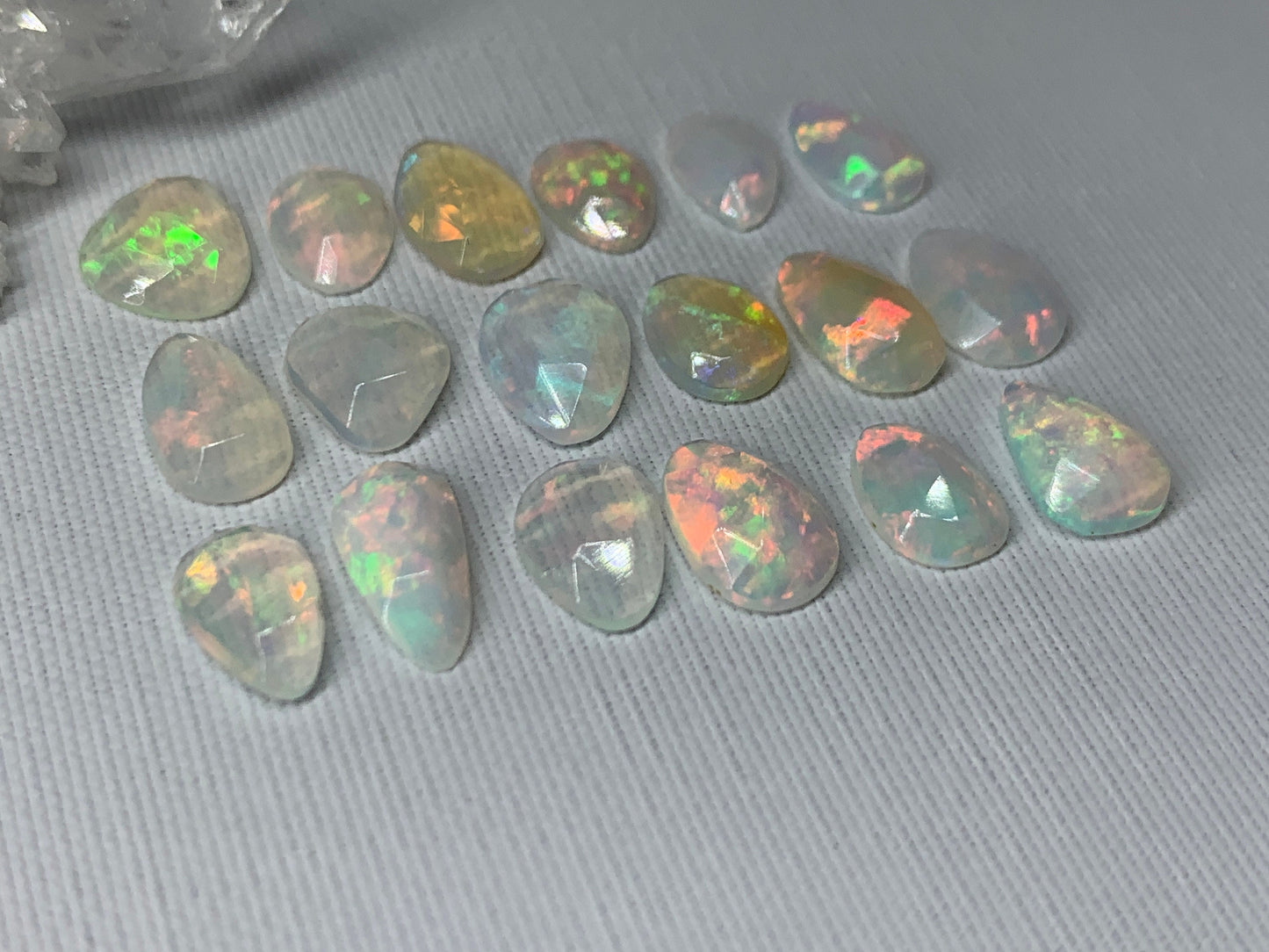 Faceted Ethiopian Opal 8-11mm long cabochon