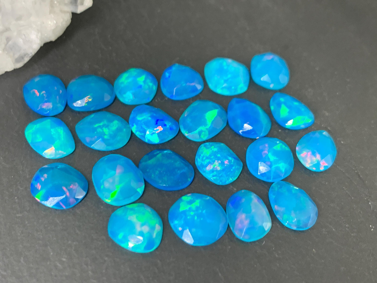 Faceted Blue Ethiopian Opal 8-9mm long cabochon