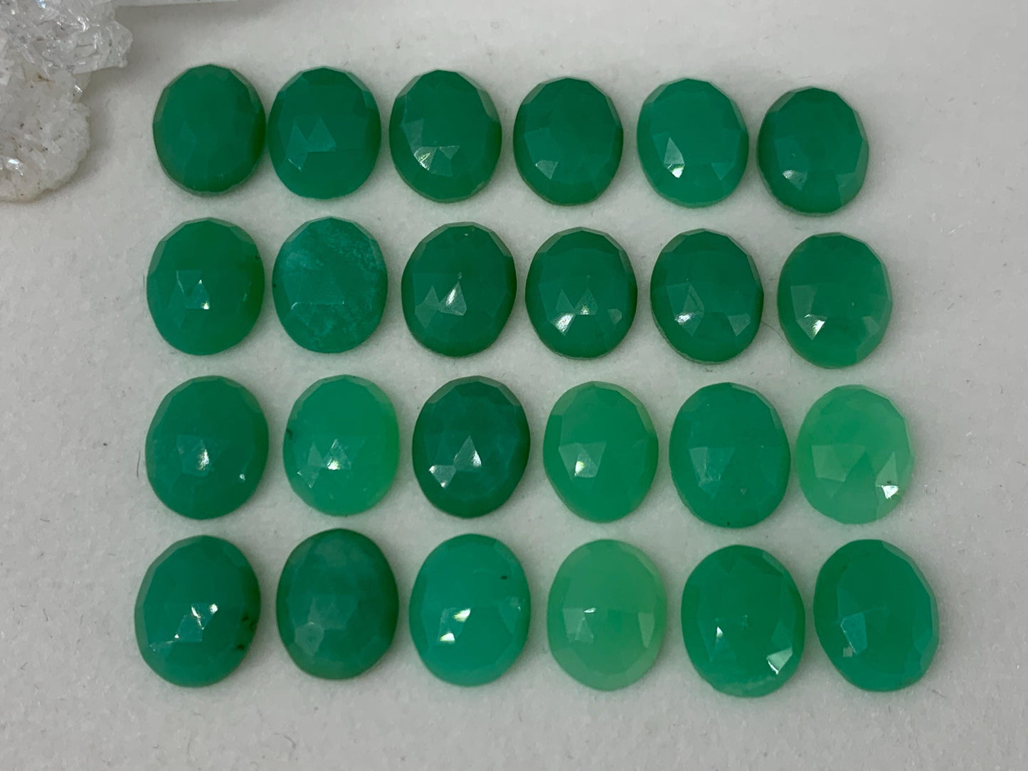 Faceted Chrysoprase oval 8x10mm cabochon