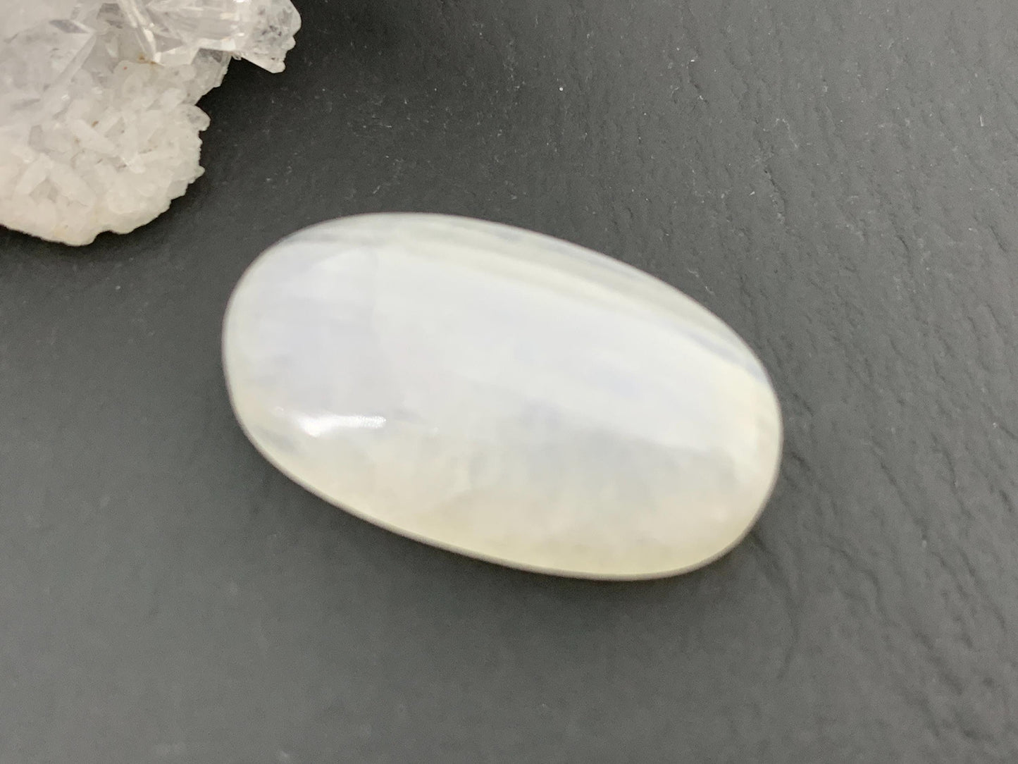 Rainbow Moonstone oval 24x13x8mm cabochon