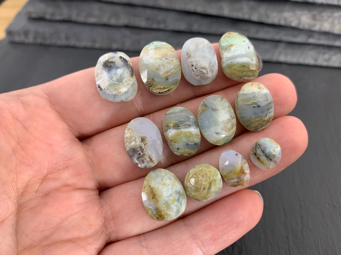Faceted Peruvian Opal 8-14mm long cabochon.
