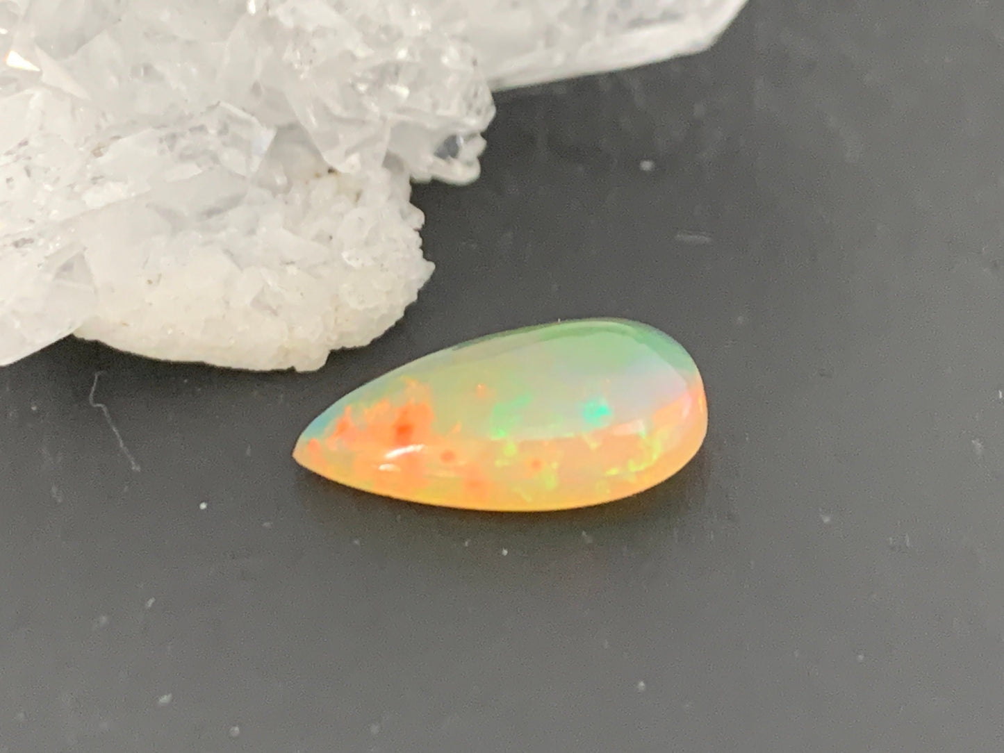 Ethiopian Opal 8x14x4mm cabochon