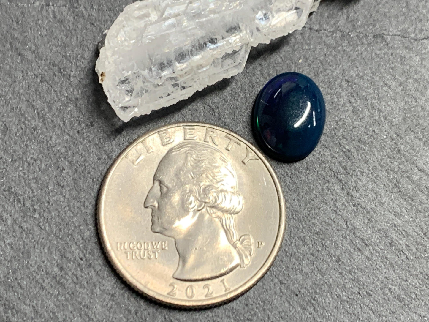 Natural Black Ethiopian Opal oval 9x11x4mm cabochon