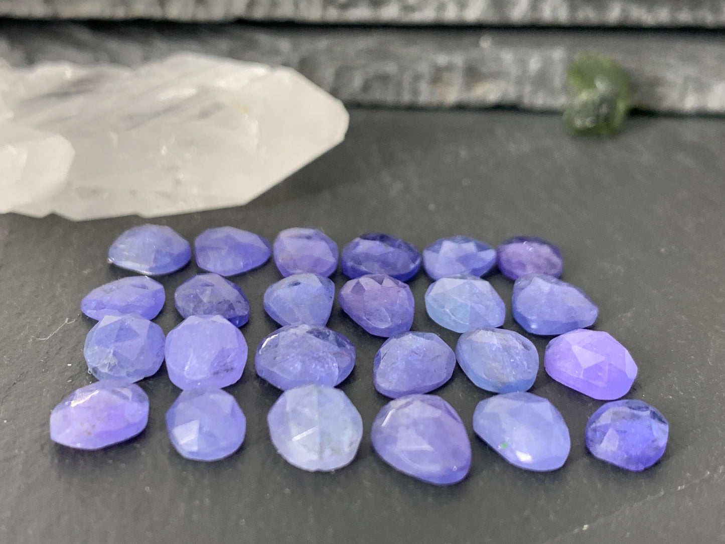 Discounted Damaged Faceted Tanzanite 8-10mm long cabochon