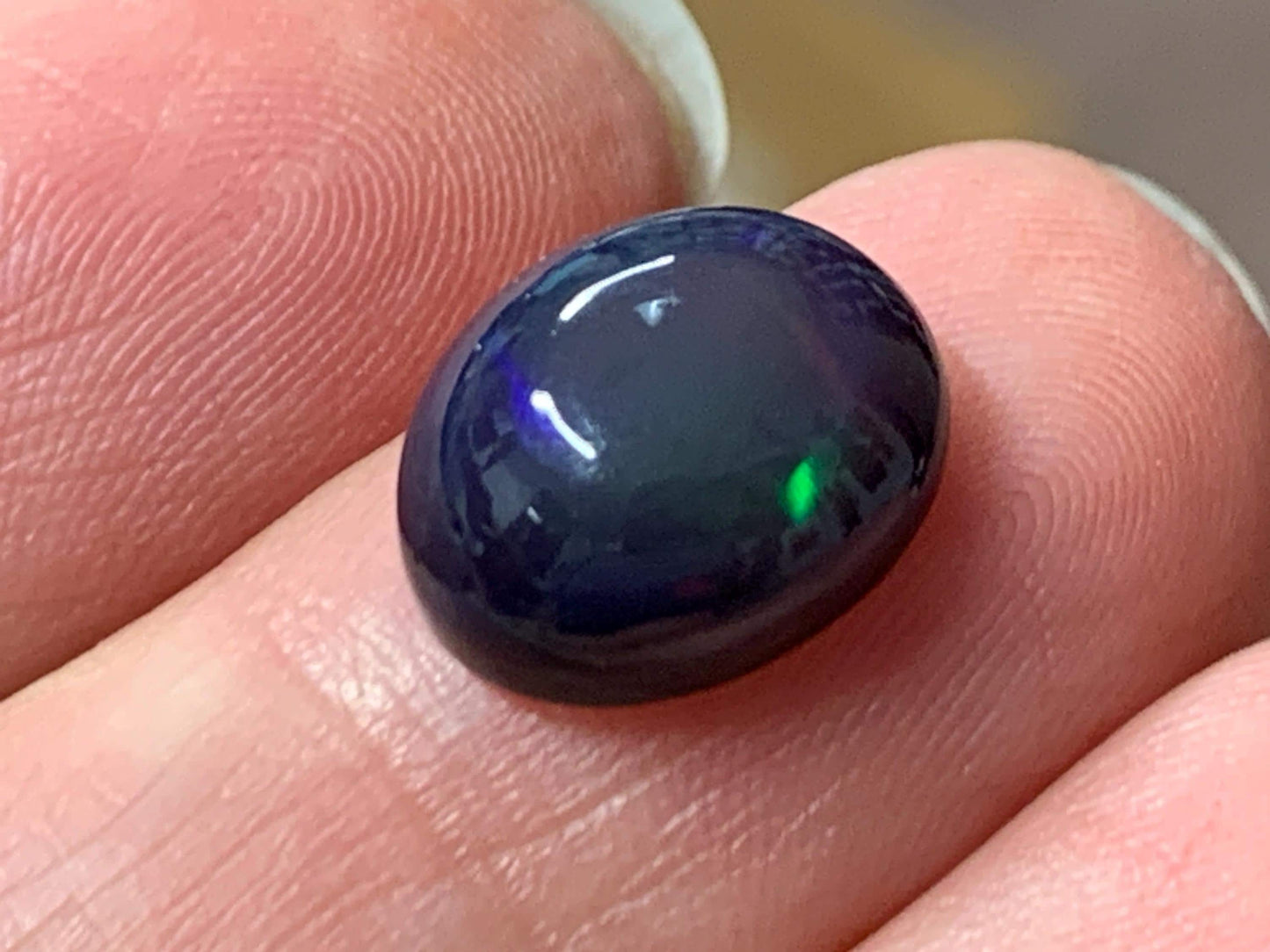 Natural Ethiopian Black Opal 9x12x6mm cabochon