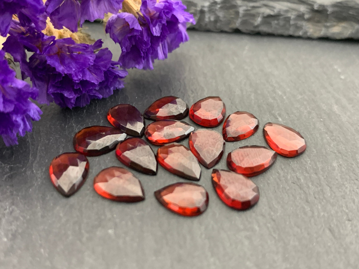 Faceted Hessonite Garnet pear 6x8mm cabochon