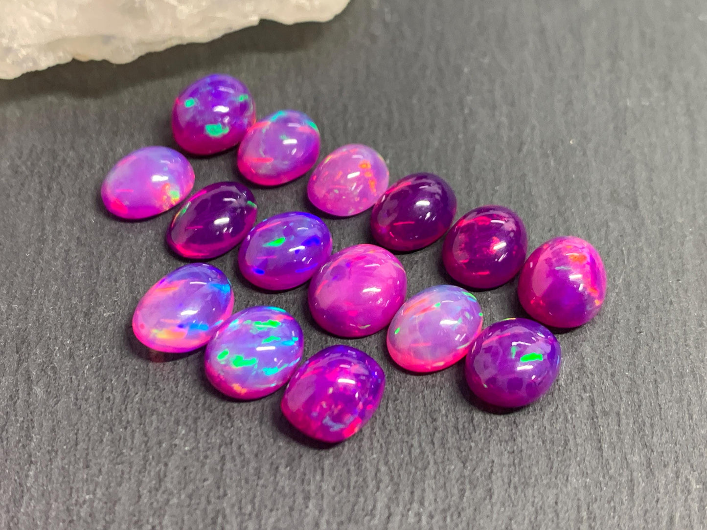 Ethiopian Opal oval 8x10mm cabochon - Natural Opal smoked to purple color