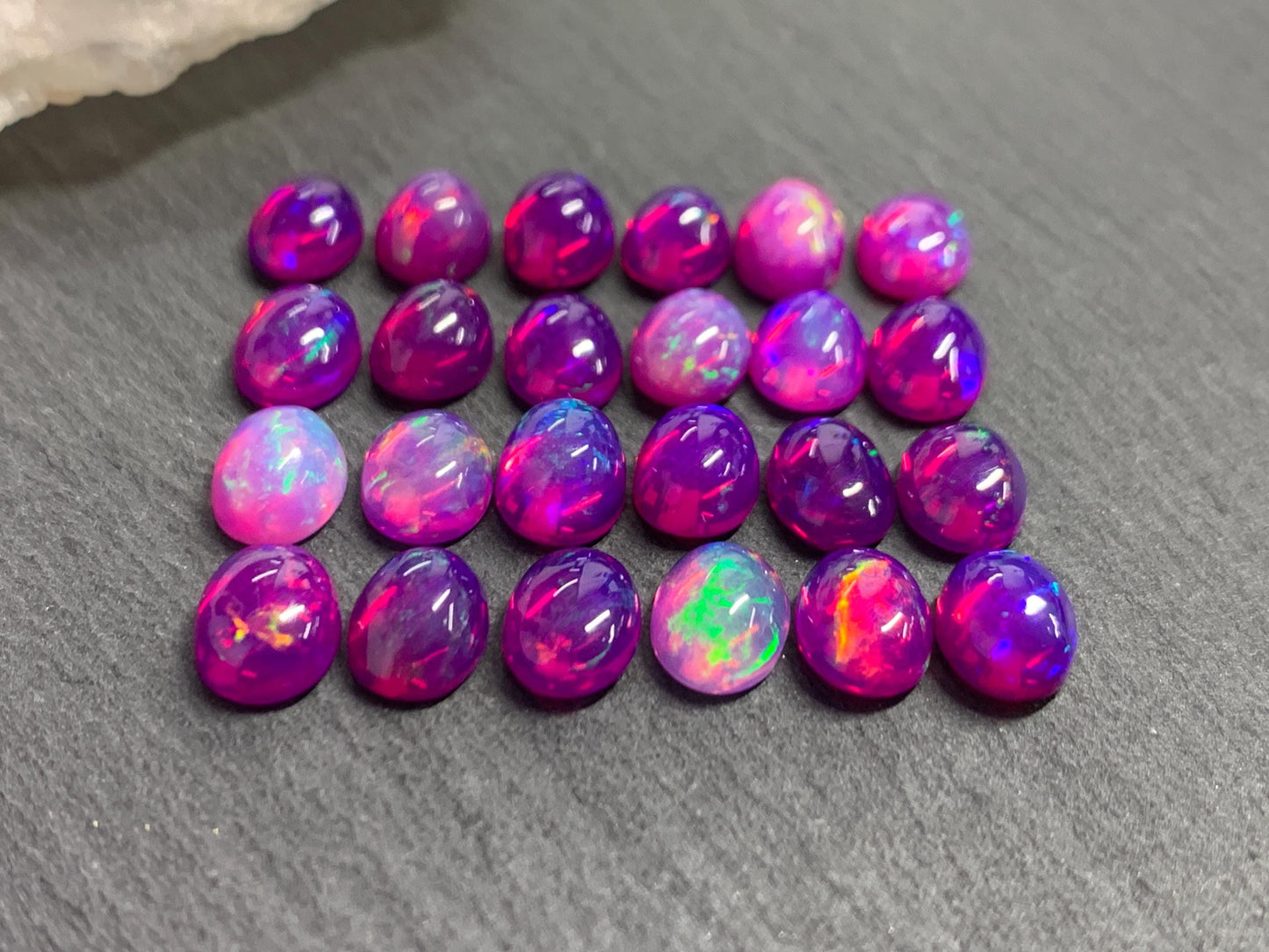 Ethiopian Opal oval 8x10mm cabochon - Natural Opal smoked to purple color