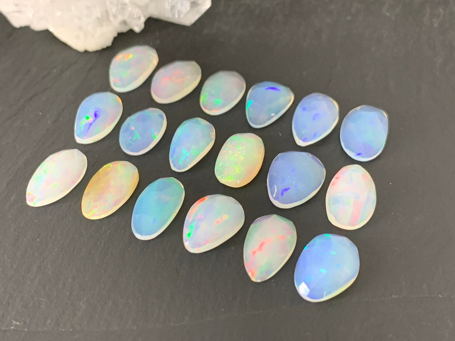 Faceted Ethiopian Opal oval 13mm cabochon