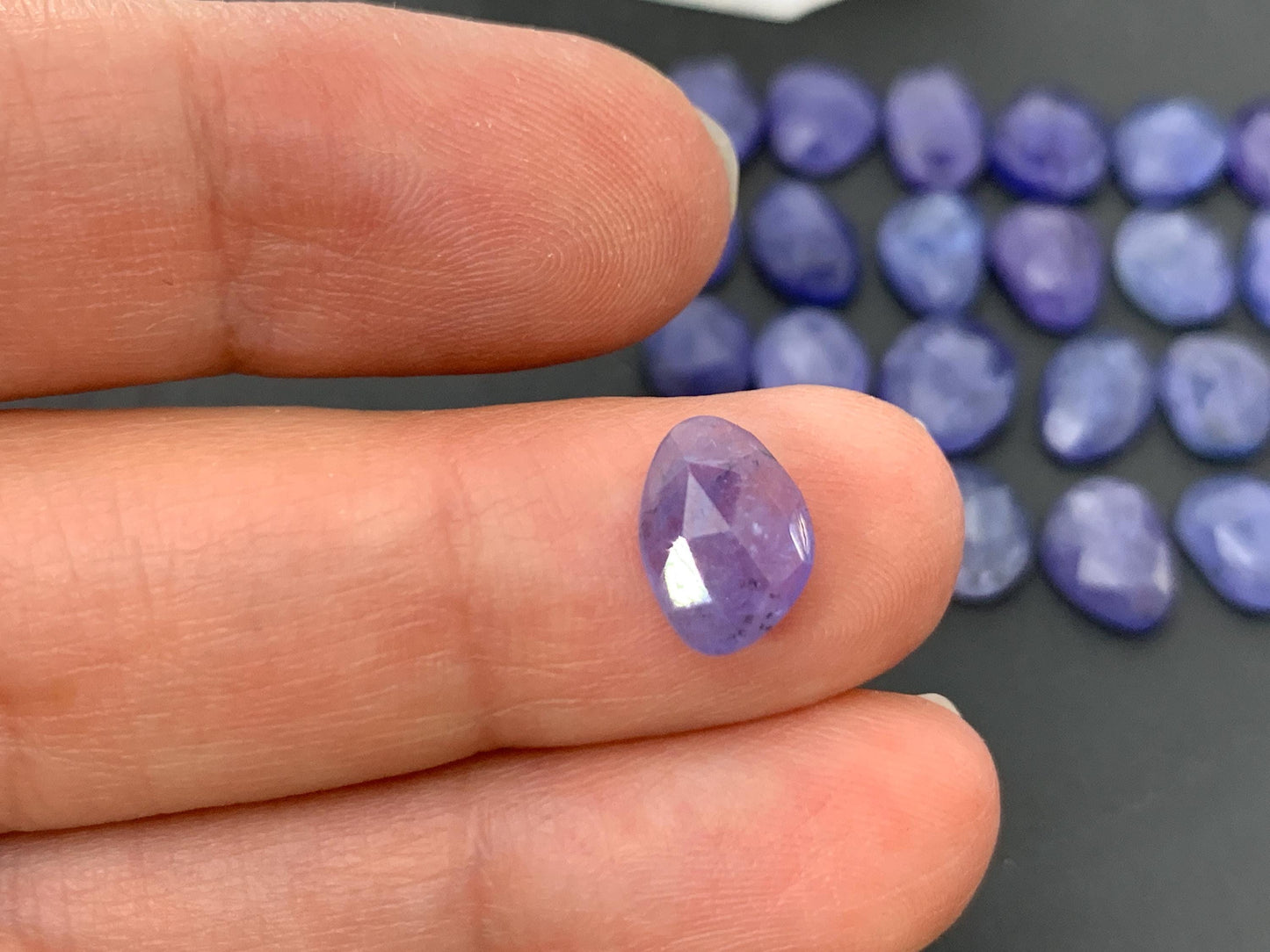 Discounted Damaged Faceted Tanzanite 8-10mm long cabochon