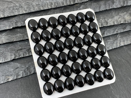 Black Agate oval 8x10mm cabochon - Calibrated cabochons
