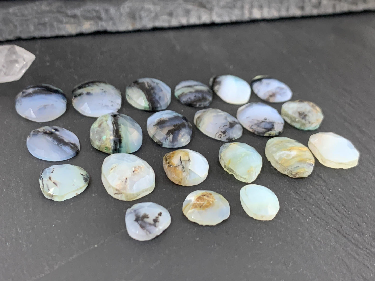 Faceted Peruvian Opal oval, pear 10-17mm long cabochon