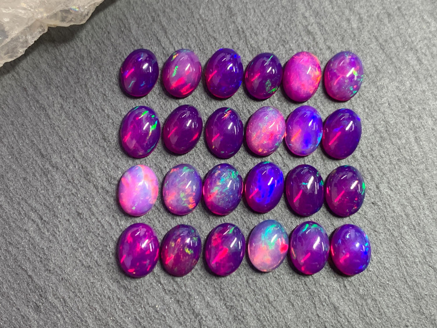 Ethiopian Opal oval 8x10mm cabochon - Natural Opal smoked to purple color