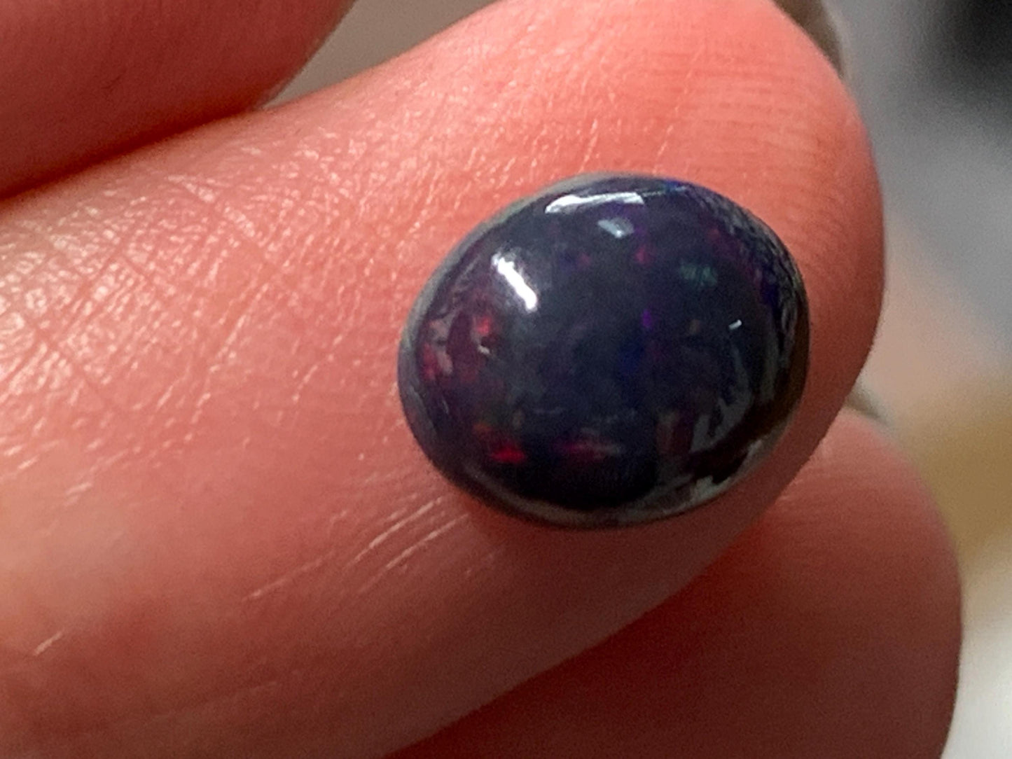 Natural Ethiopian Black Opal 7x9x4mm cabochon