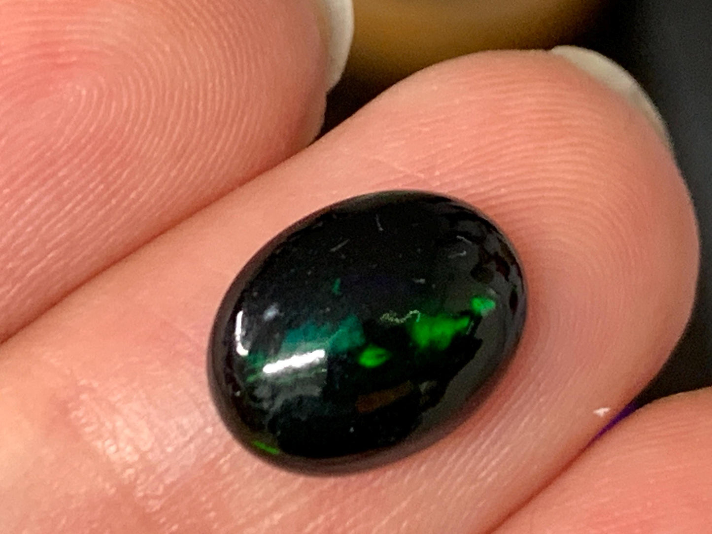 Natural Ethiopian Black Opal 8x11x3.5mm cabochon