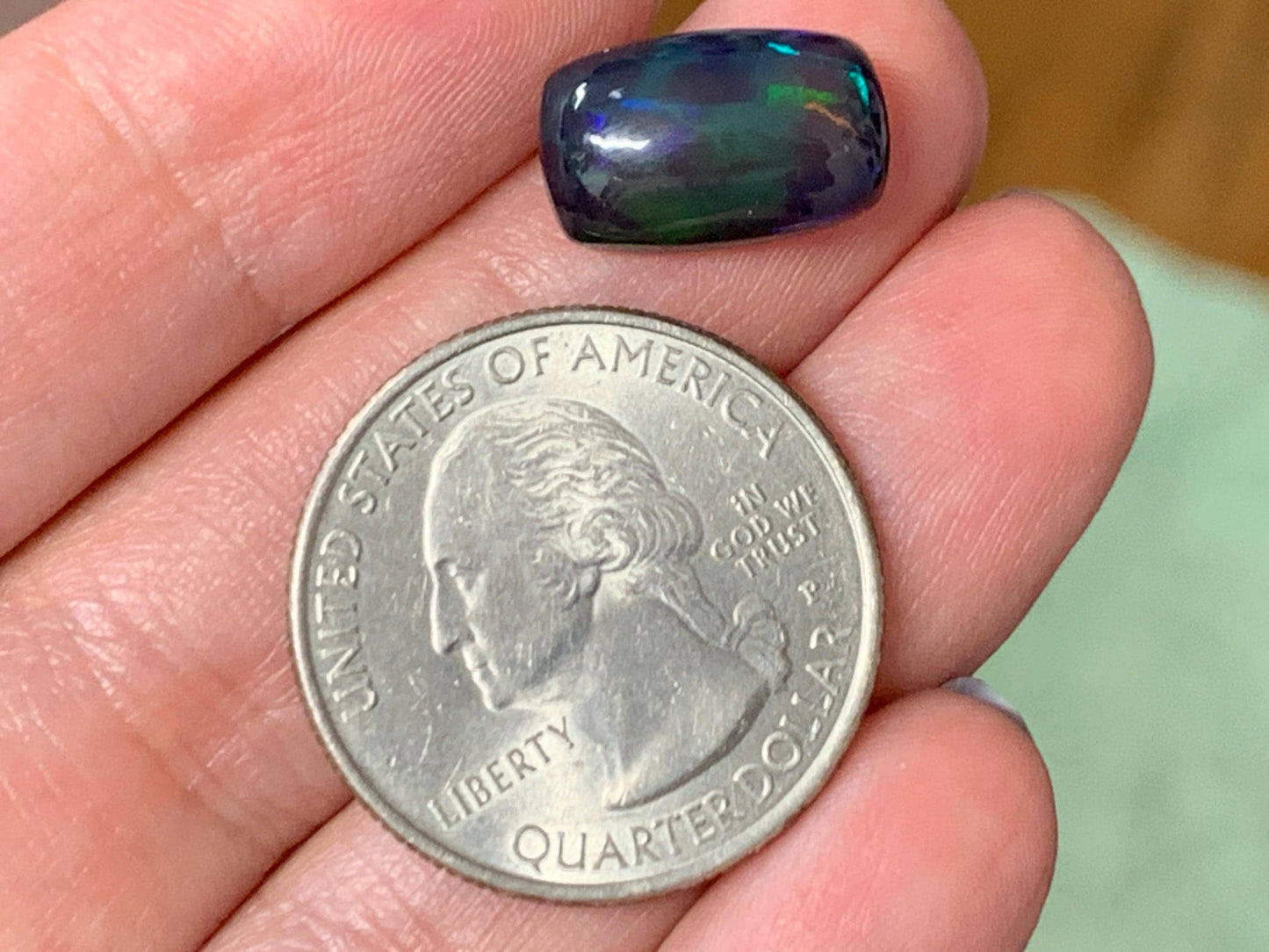 Natural Ethiopian Black Opal 9x14x5mm cabochon