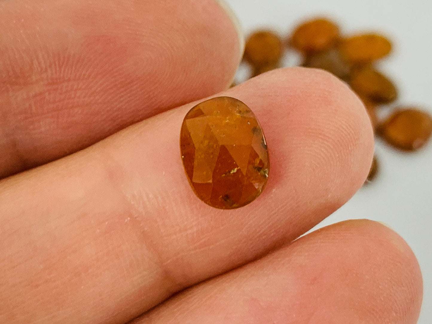 Faceted orange Kyanite oval 7x12mm cabochons