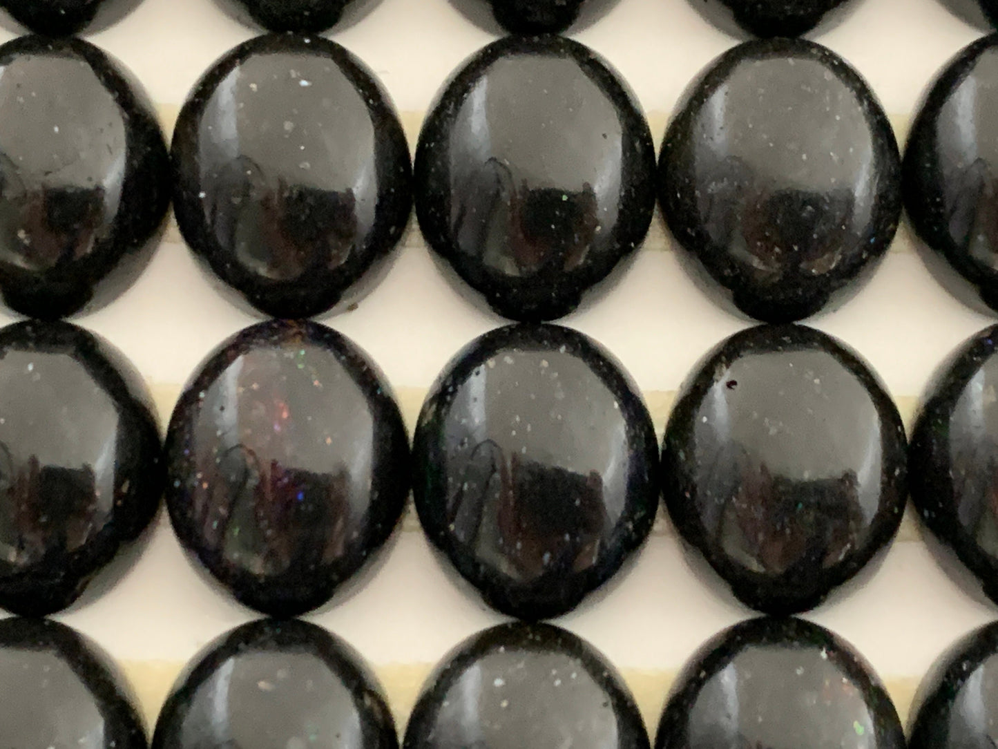 Black Andamooka Opal oval 10x12mm cabochon - Matrix Australian Opal