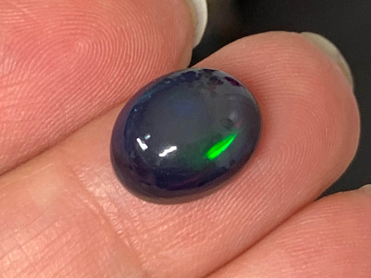 Natural Ethiopian Black Opal 9x12x6mm cabochon