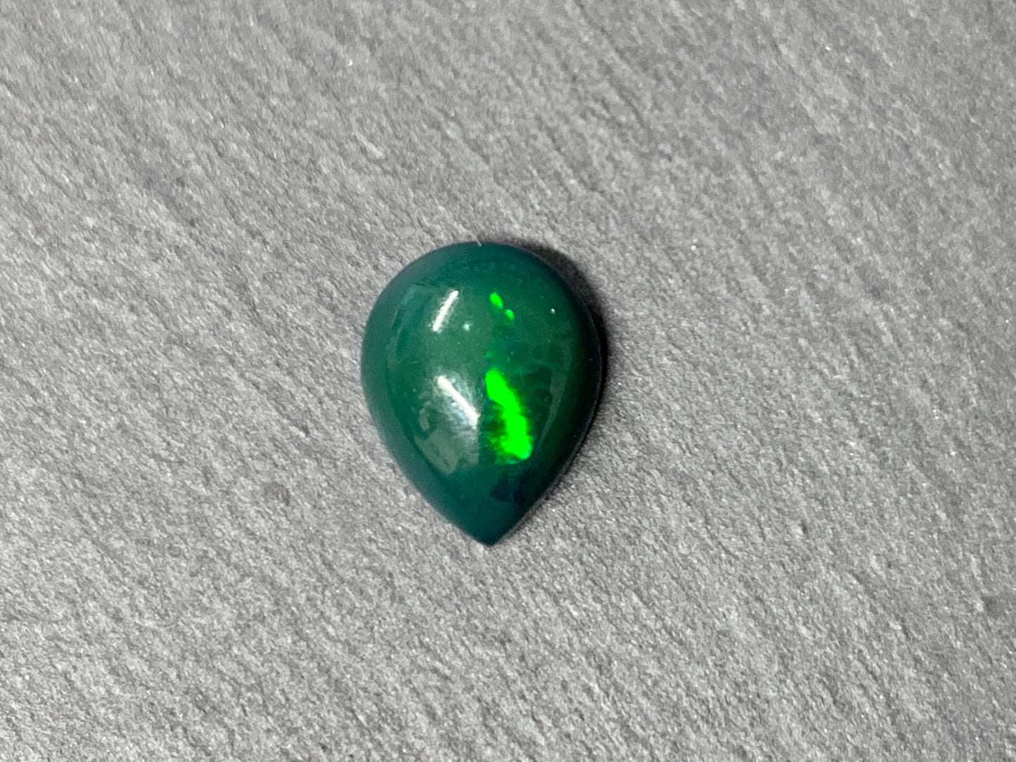 Black Ethiopian Opal pear 8x10x4mm cabochon