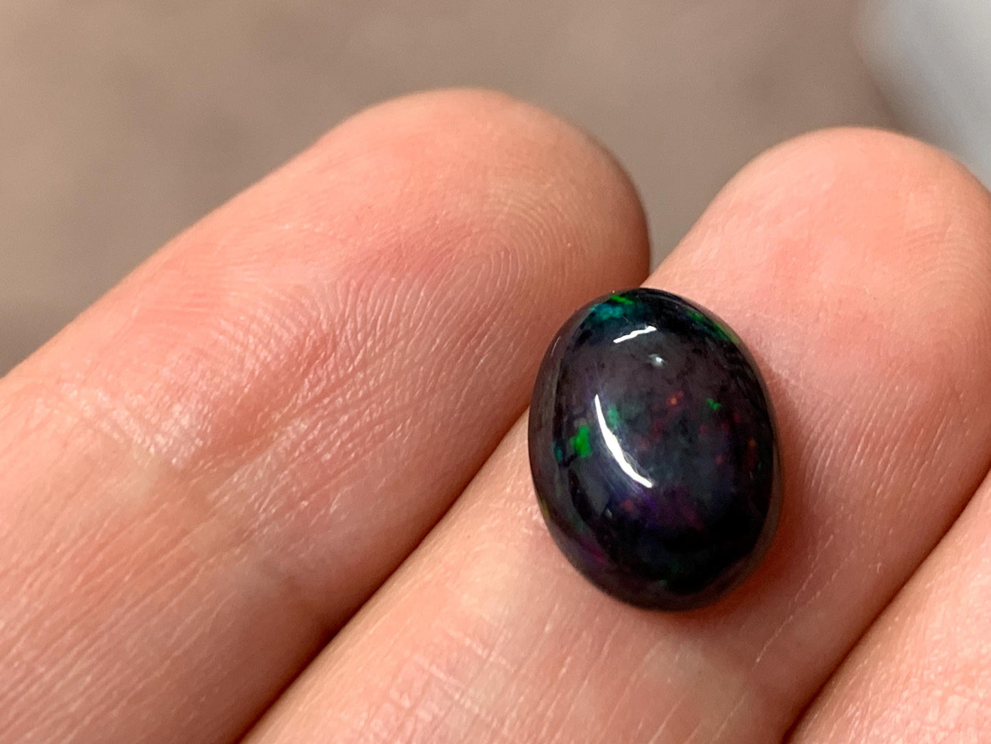 Black Ethiopian Opal oval 9x12x4mm cabochon