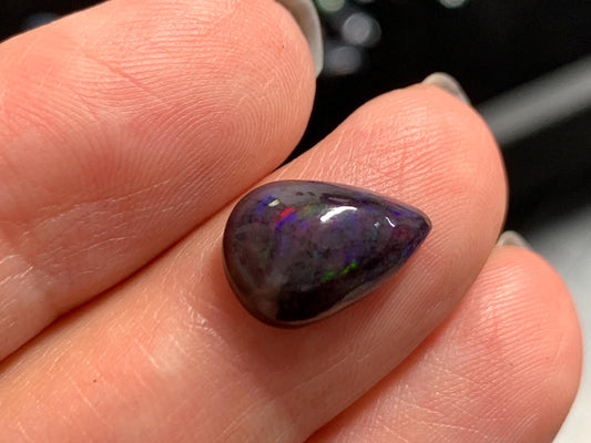 Natural Ethiopian Black Opal 8x13x4mm cabochon