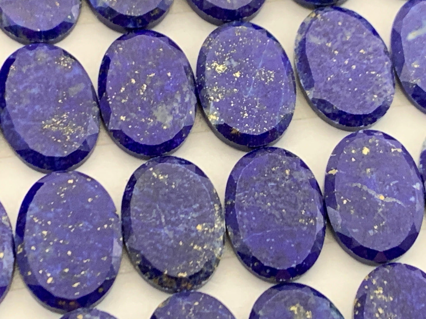 Flat Lapis Lazuli oval 10x14mm cabochon with facted edge - calibrated cabochons