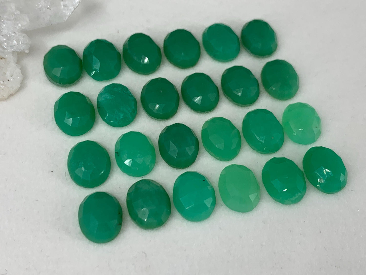 Faceted Chrysoprase oval 8x10mm cabochon