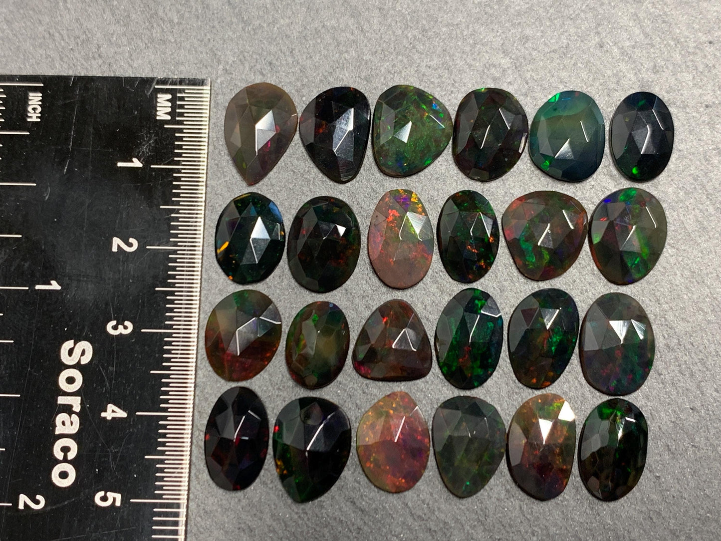 Faceted Black Ethiopian Opal 10-13mm long cabochon