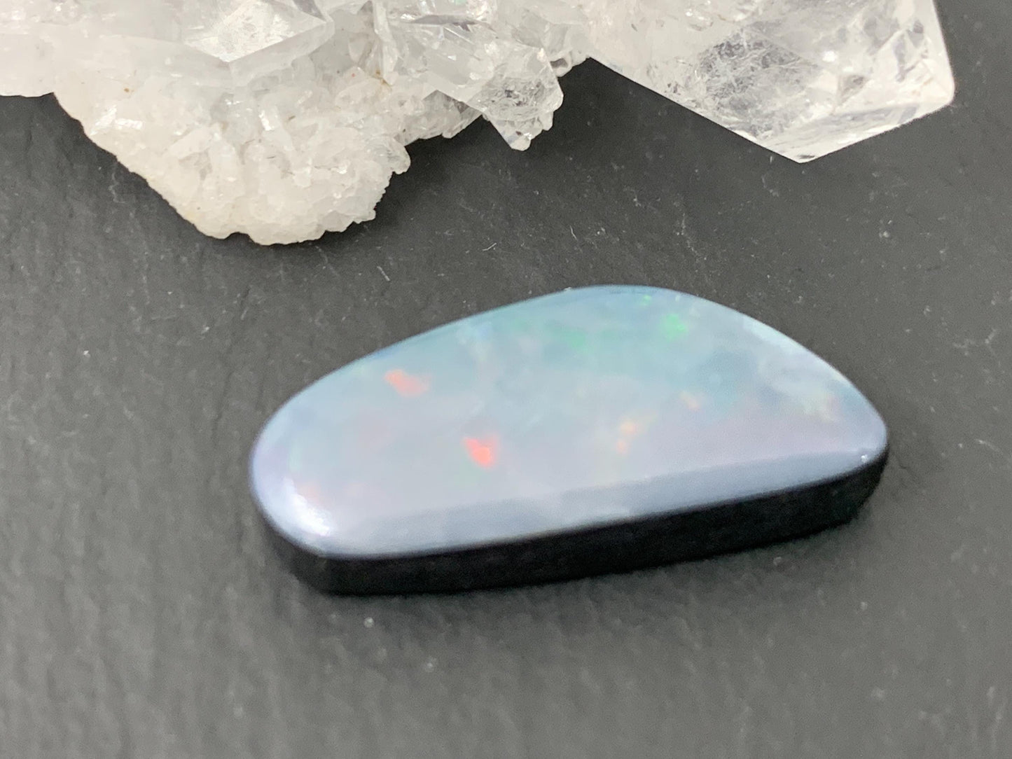 Australian Opal doublet 10x22x5mm cabochon