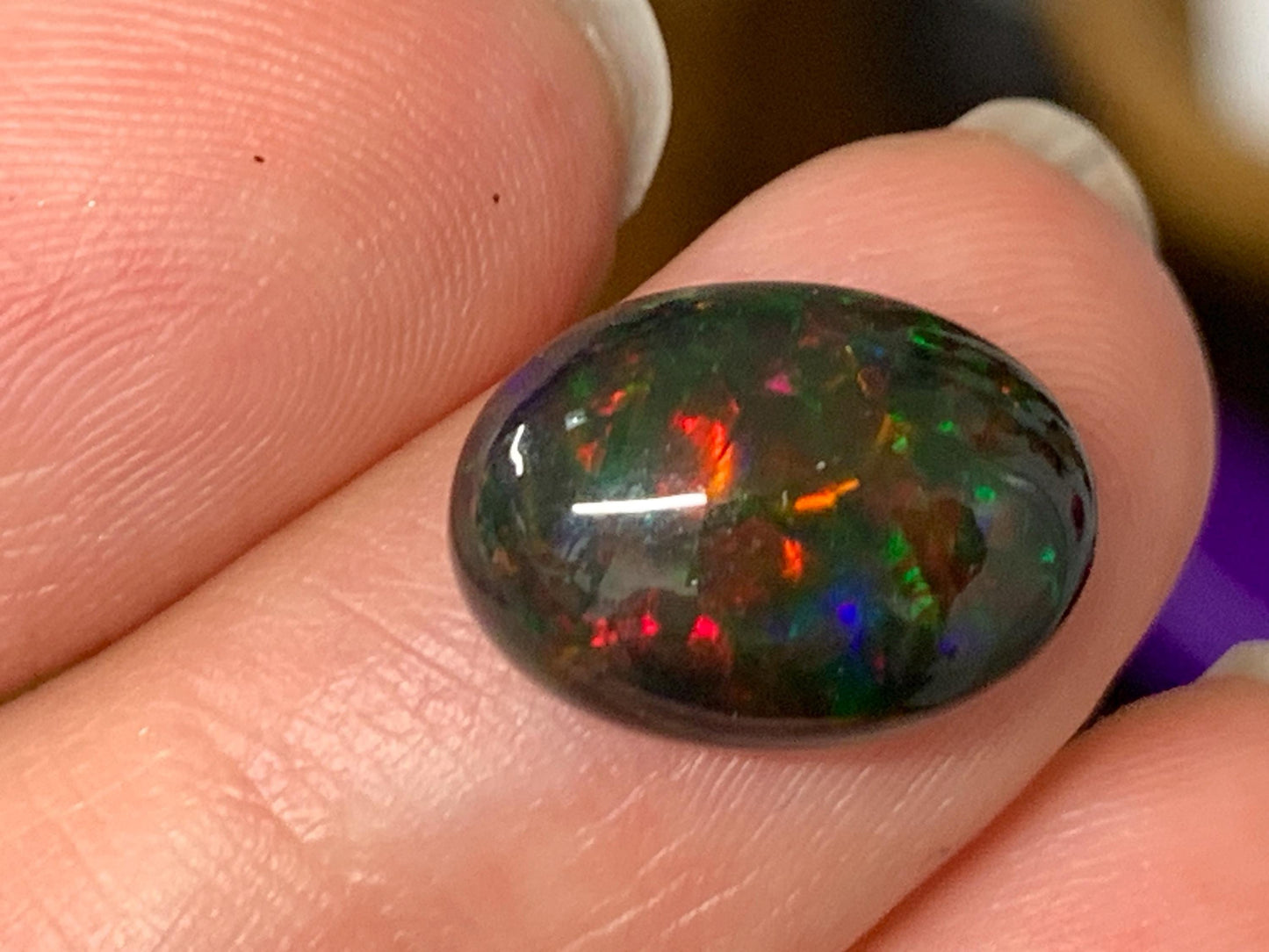 Natural Ethiopian Black Opal 10x13x5mm cabochon