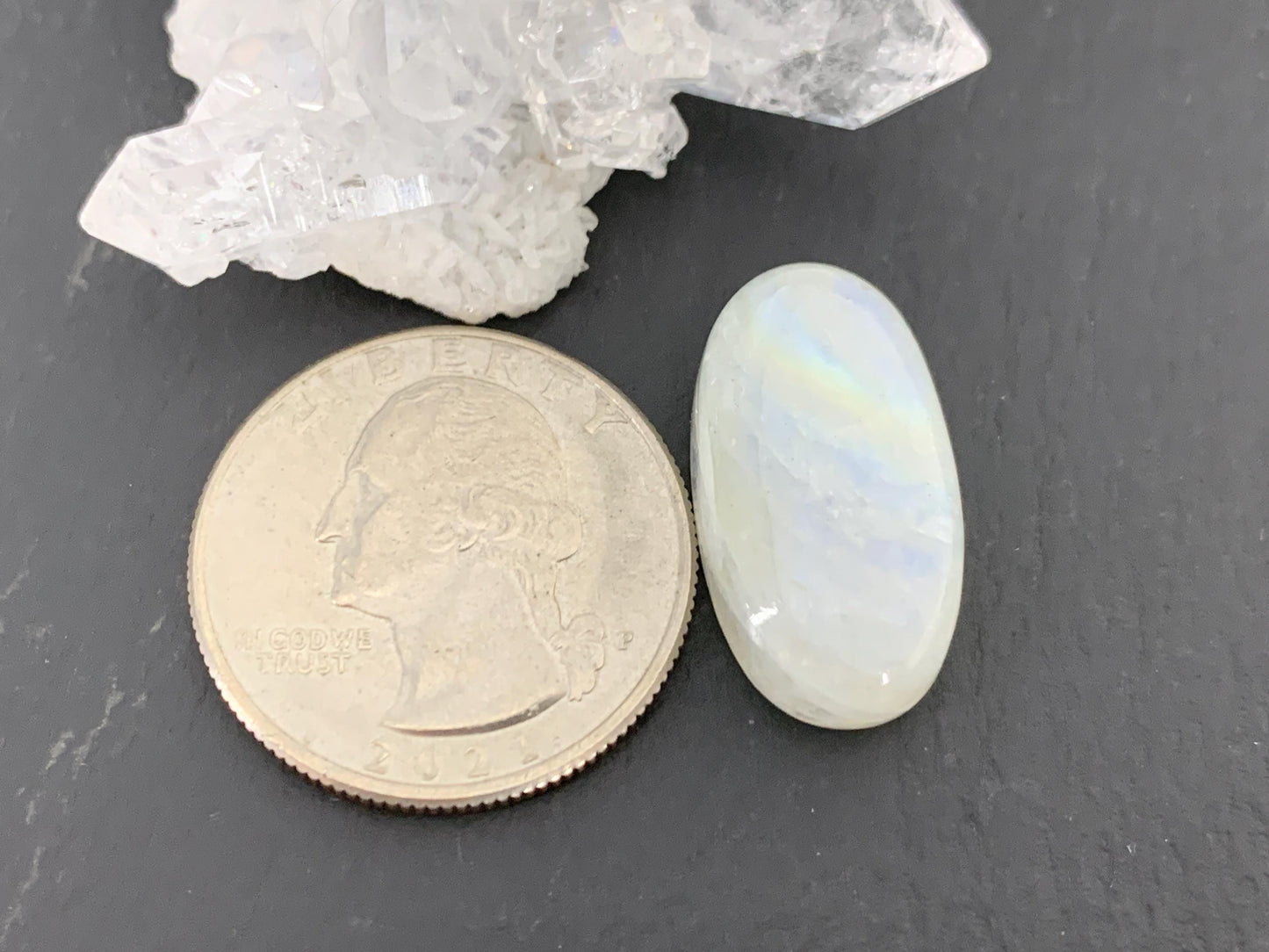 Rainbow Moonstone oval 23x12x7mm cabochon
