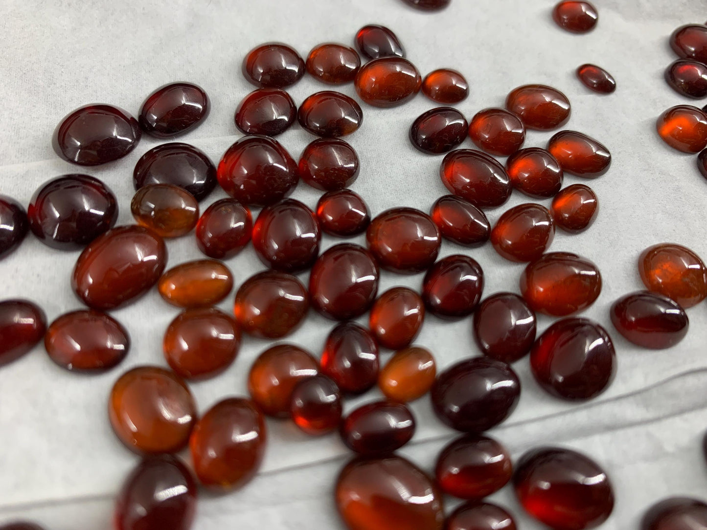 Hessonite Garnet oval, round 7-11mm long cabochon