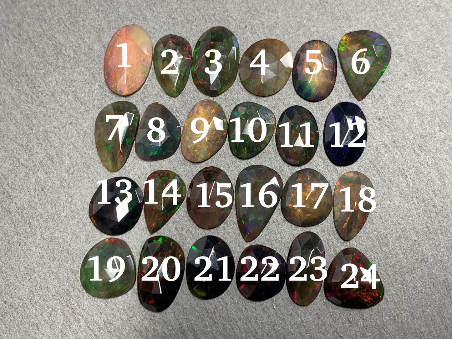 Faceted Black Ethiopian Opal 12-16mm long cabochon