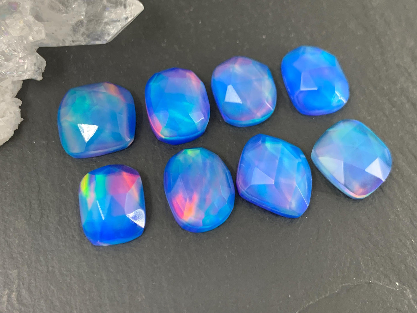 Faceted Aurora Opal free form 10-11mm long doublet cabochons