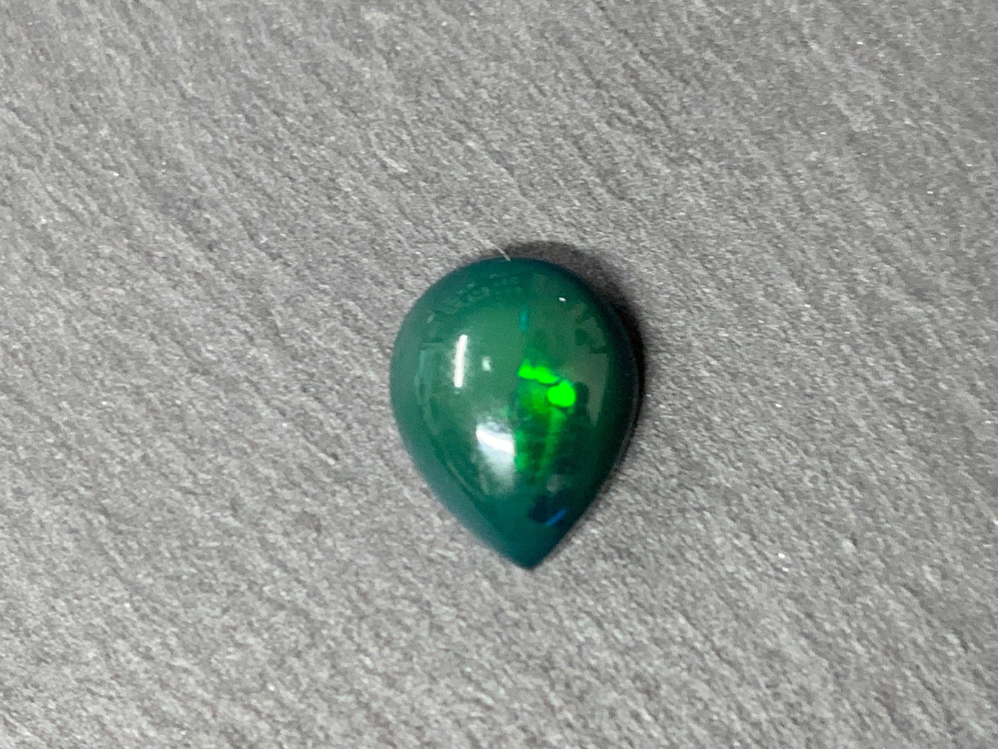 Black Ethiopian Opal pear 8x10x4mm cabochon
