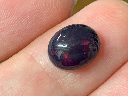 Natural Ethiopian Black Opal 8x10x5mm cabochon