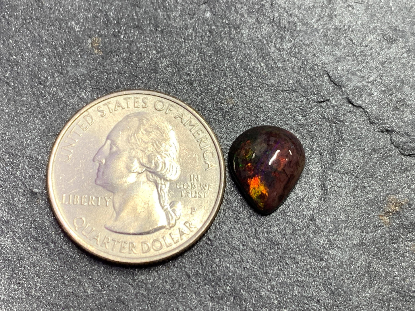 Black Ethiopian Opal pear 10x12x4mm cabochon