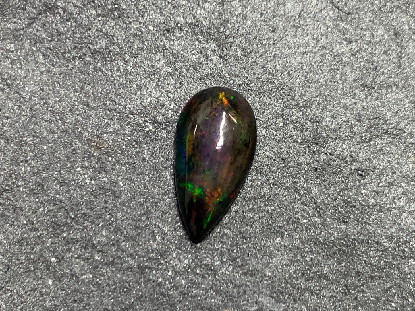 Black Ethiopian Opal pear 7x14x4mm cabochon