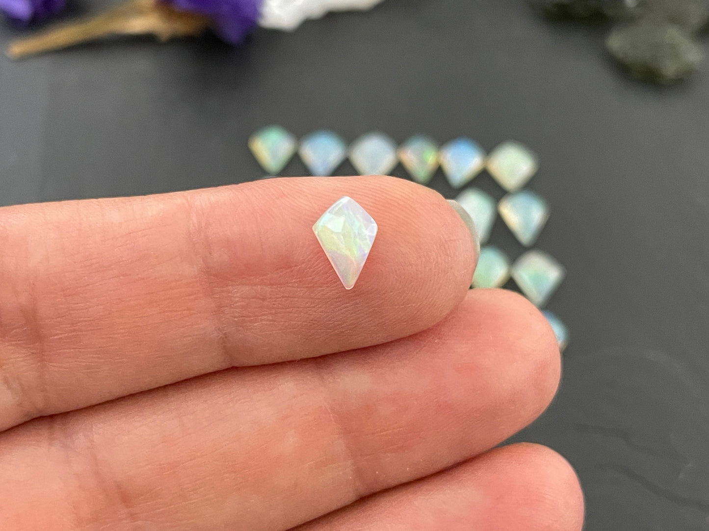 Faceted Ethiopian Opal kite 7-8mm long cabochon