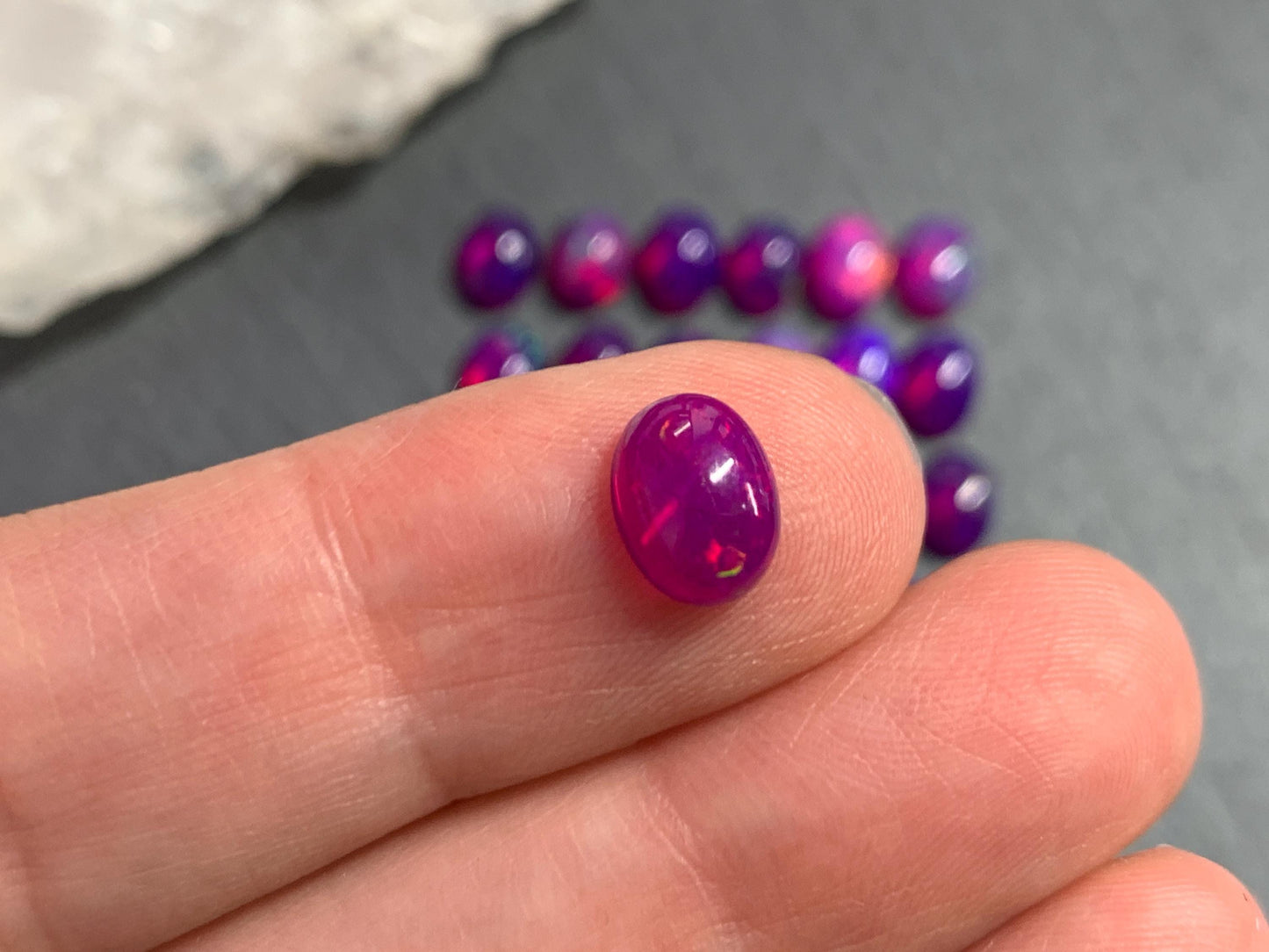 Ethiopian Opal oval 8x10mm cabochon - Natural Opal smoked to purple color