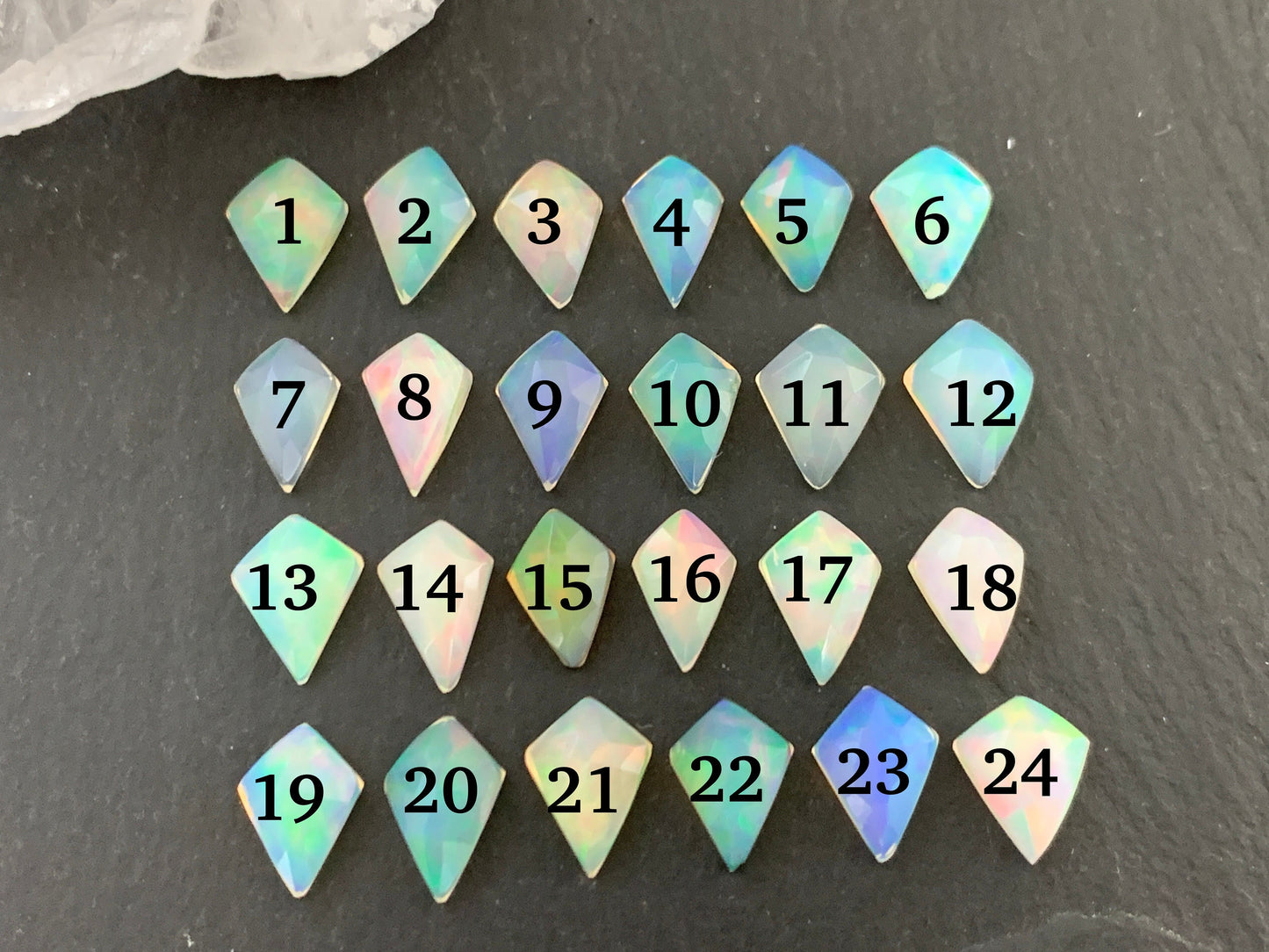 Faceted Welo Opal kite 7x9mm cabochon