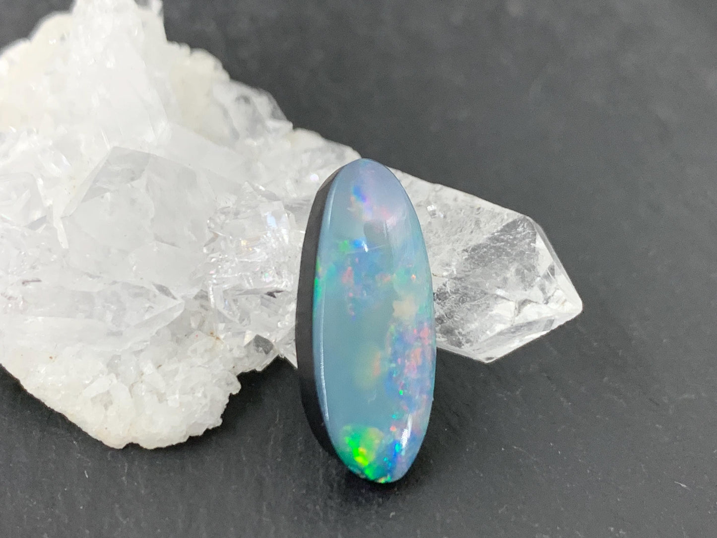 Australian Opal doublet 8x18x4mm cabochon - oval