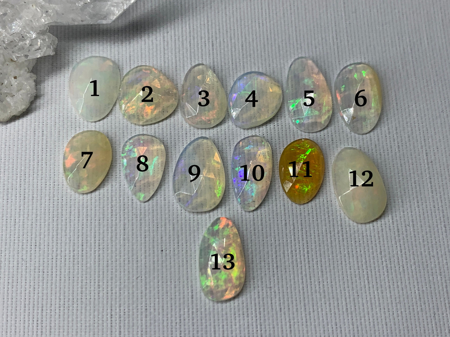 Faceted Ethiopian Opal 10-12mm long cabochon