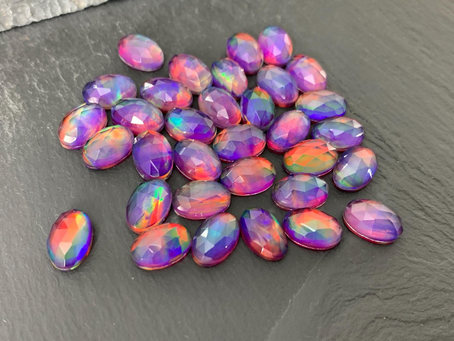 Faceted Aurora Opal oval 8x12mm cabochon - Doublet cabochons