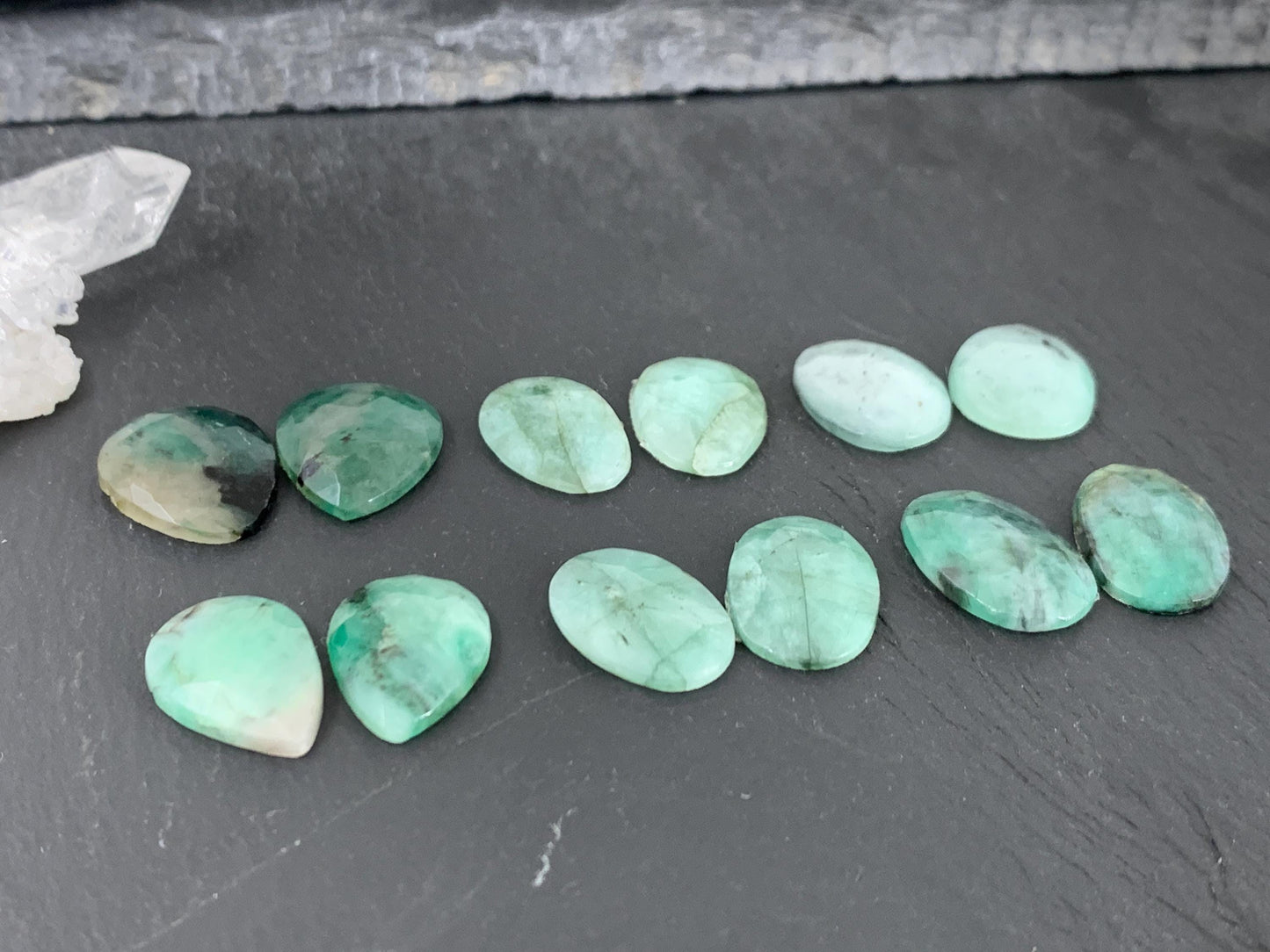 Faceted Emerald pair 15-17mm long cabochon